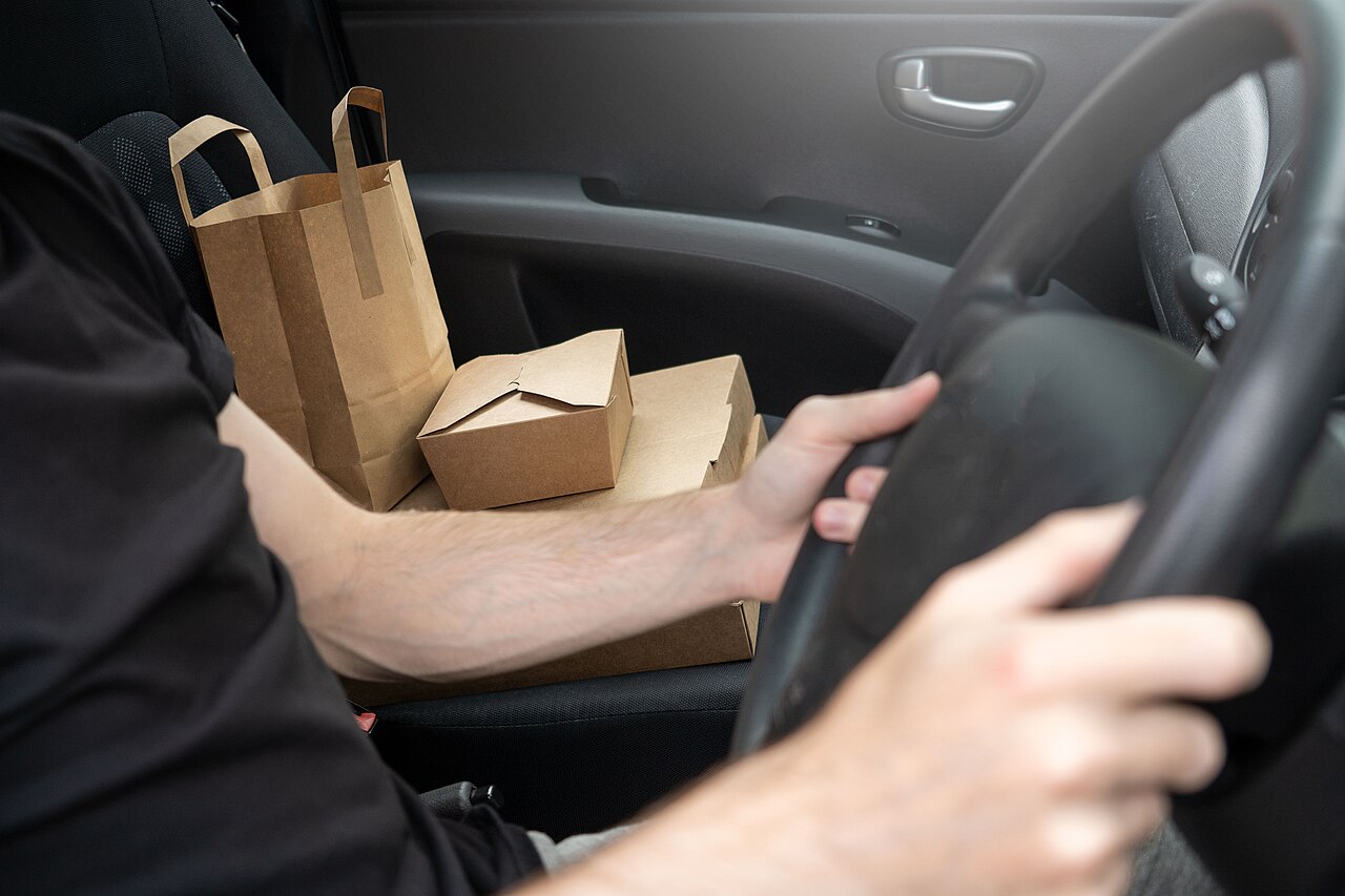 Driver preparing to transport packaged items